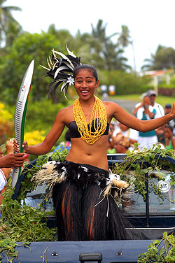 Uirangi Bishop. On the southern island of Aitutaki. Miss 2005 Dancer of the Year Uirangi Bishop dances on the back of a truck as the baton tours through the local community.